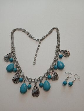 #1196.  Faux Turquoise & Silver Toned Charm Necklace & Earring Set.